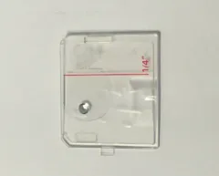 NEEDLE PLATE COVER